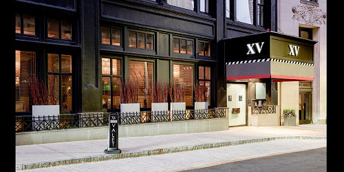 Hotel Entrance at Night with Valet Sign - XV Beacon - Boston, MA