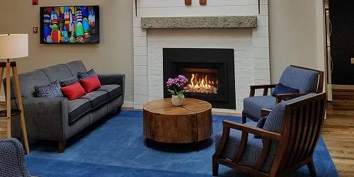 Fireplace Sitting Area - Rockport Inn & Suites - Rockport, MA